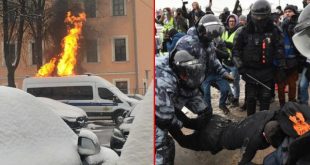 Rusya'daki protestocular Polis arabasını ateşe verdiler