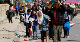 Palestinians fleeing north Gaza move southward, in the central Gaza Strip